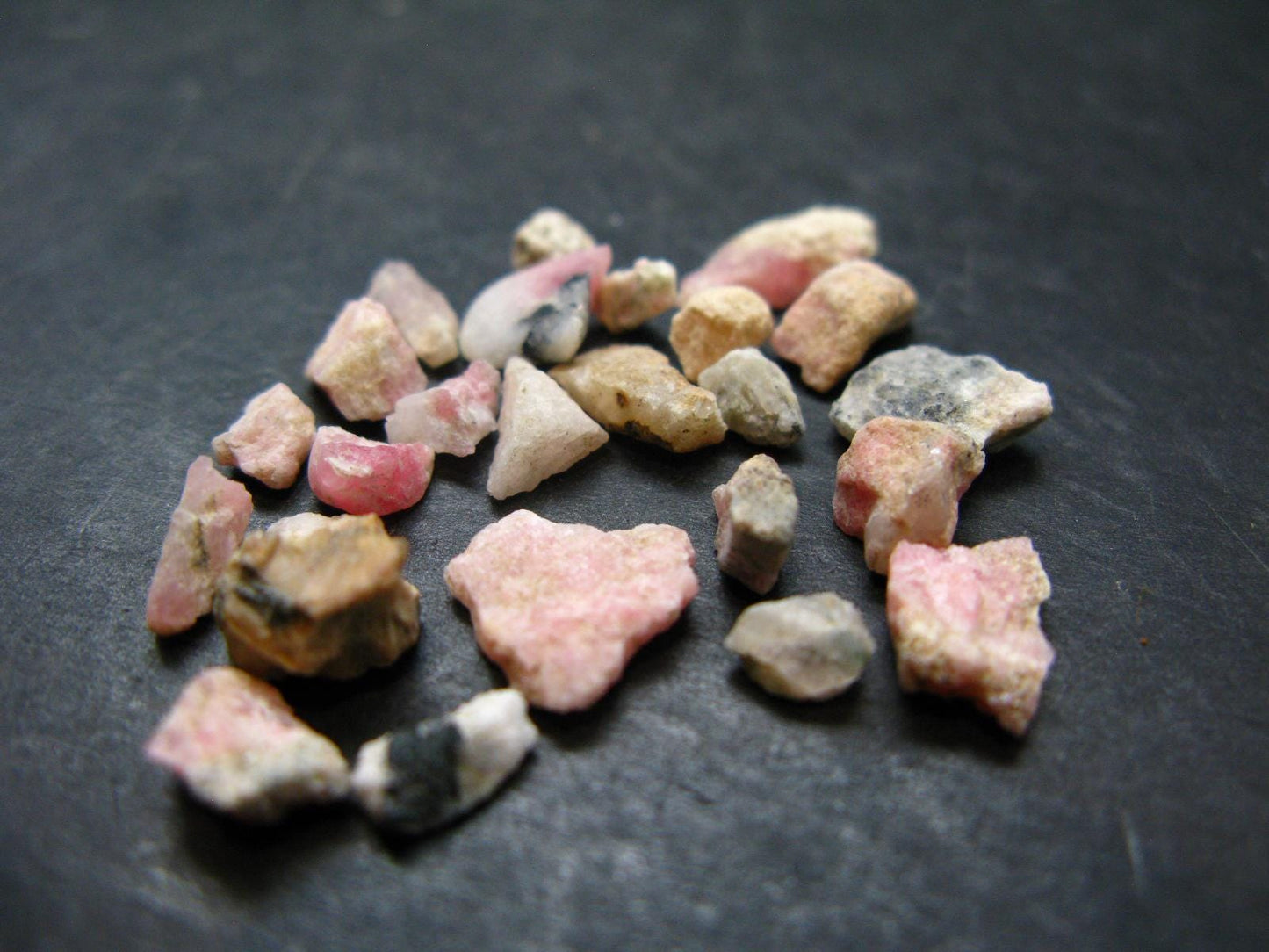 Lot of 25 Rare Pink Tugtupite Raw Pieces From Greenland - 4.22 Grams