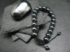 Hematite Genuine Bracelet ~ 7 Inches ~ 10mm Round Beads - w/ Drawstring