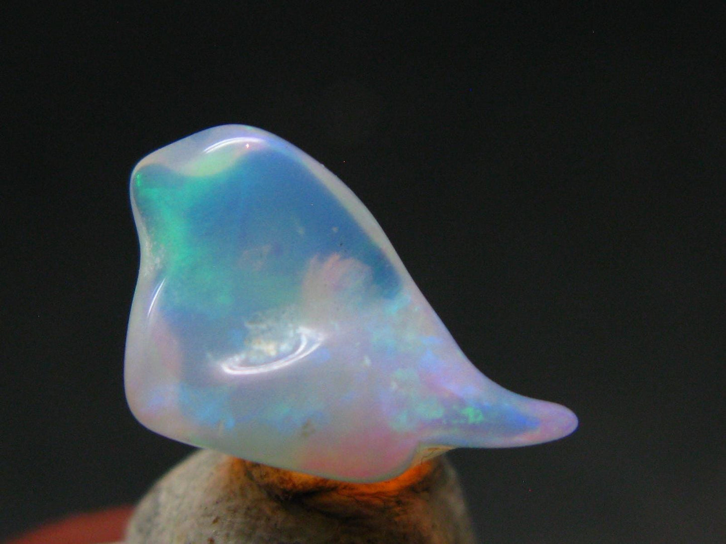 Natural Polished Opal With Play of Color from Ethiopia - 0.6" - 2.73 Carats