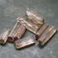 Lot of 10 Purple Scapolite Crystals from Afghanistan - 7.27 Grams