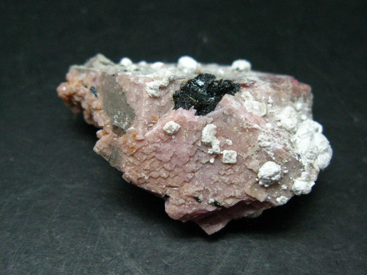 Rare Rhodochrosite crystal from Canada - 1.7"