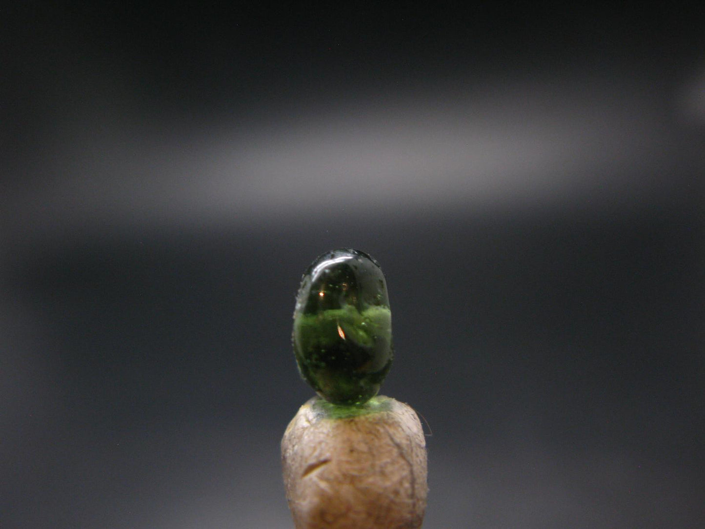 Moldavite Tektite Tumbled Bead from Czech Republic - 9 mm - 3.80 Carats