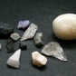 Synergy 12 Set Phenakite Moldavite Natrolite Petalite Danburite Tektite Scolecite Herderite Tanzanite Brookite 53.09 Gr