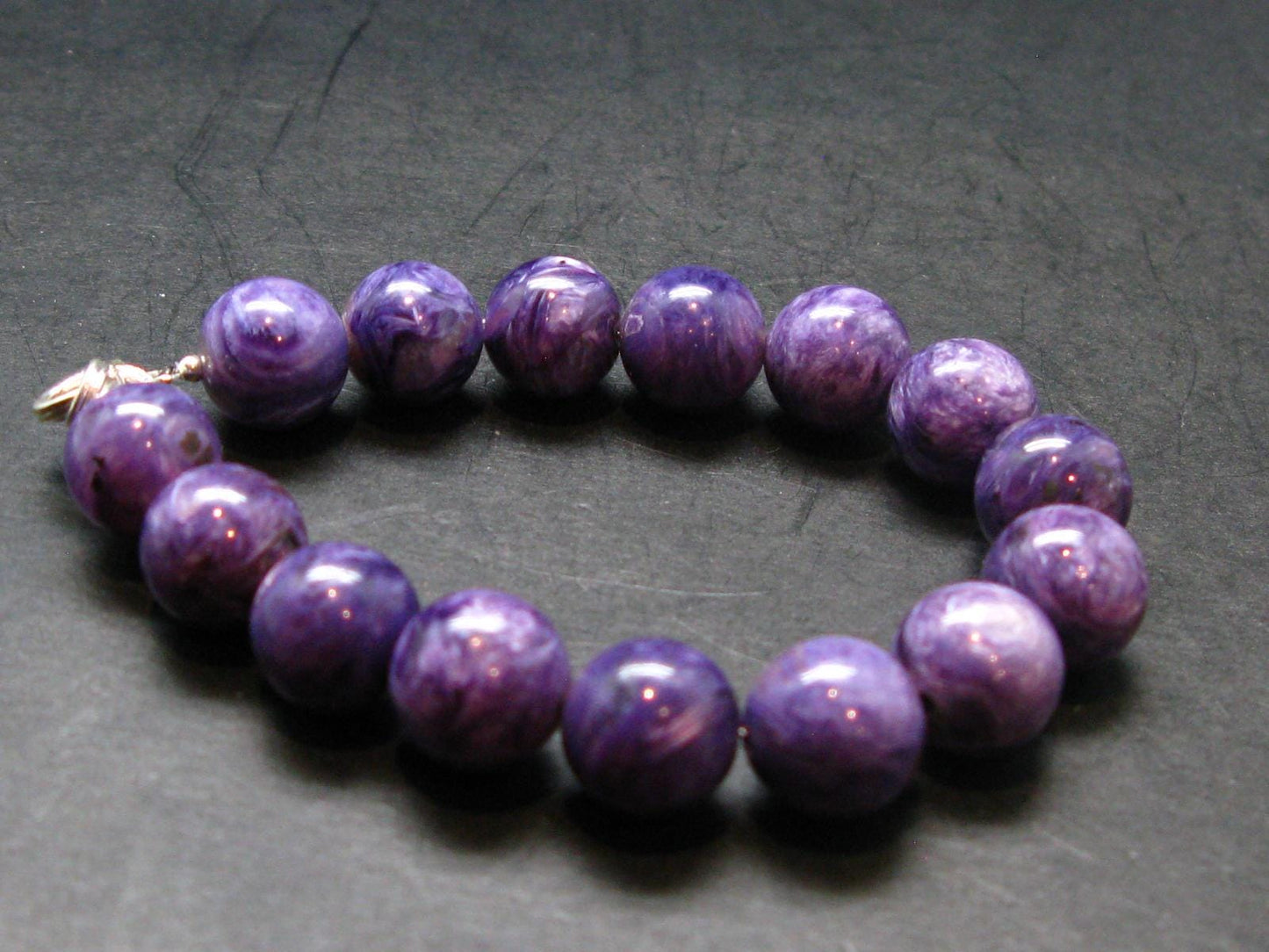 Charoite Genuine Bracelet - 25.84 Grams - 10mm Round Beads - 7 inches