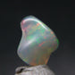 Natural Polished Opal With Play of Color from Ethiopia - 0.5" - 1.86 Carats