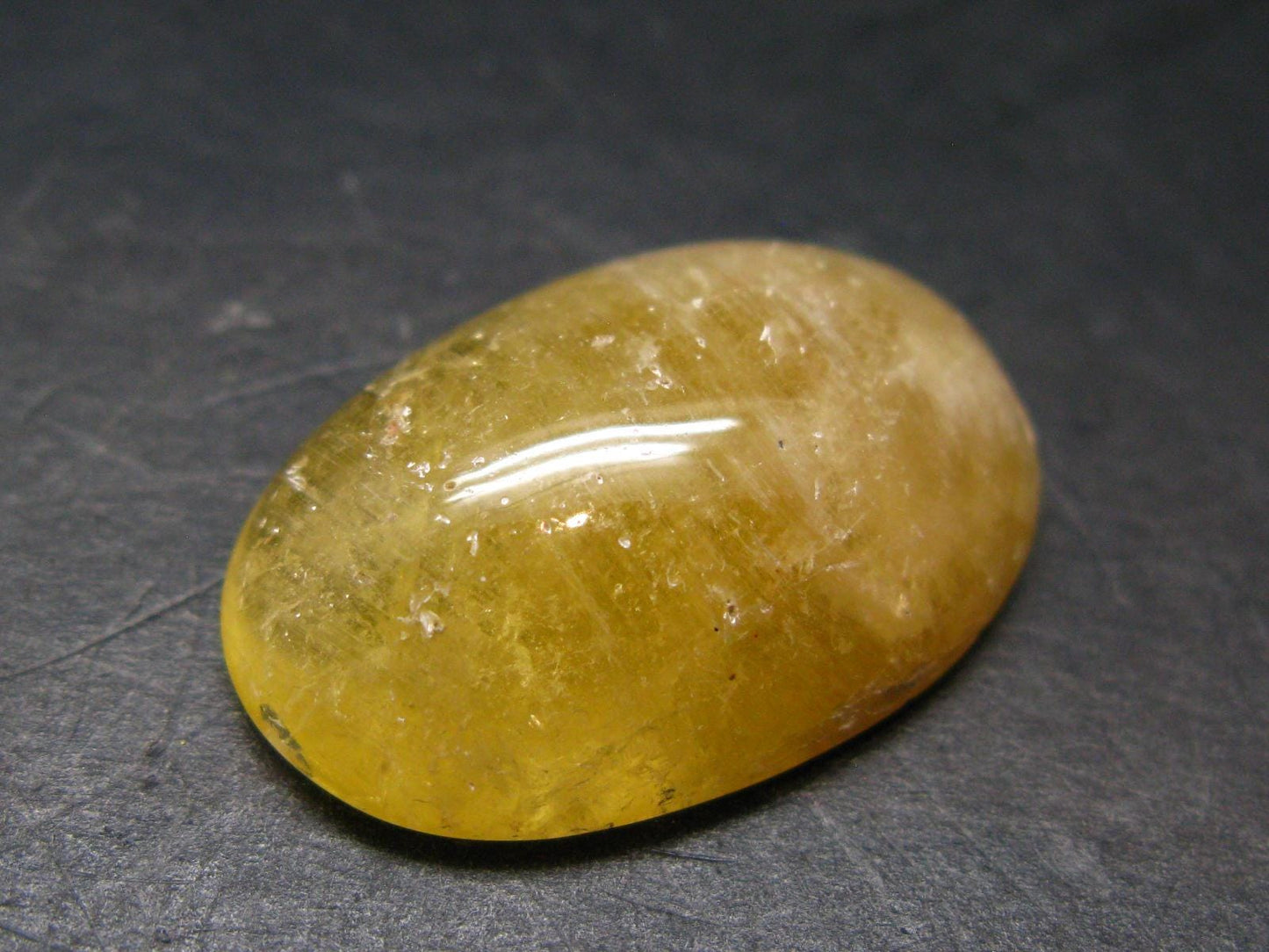 Rare Agni Gold Danburite Cabochon From Tanzania - 49.75 Carats - 1.3"