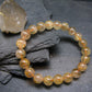 Rutilated Quartz Genuine Bracelet ~ 7 Inches ~ 9mm Round Beads