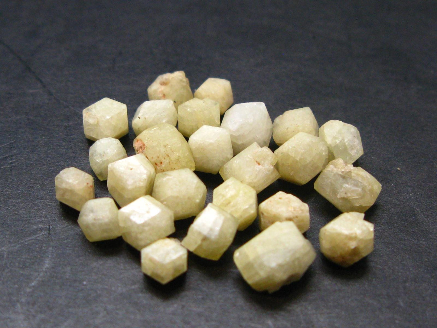 Lot of 25 Large Rhodizite Rhodozite Crystals from Madagascar - 23.20 Carats