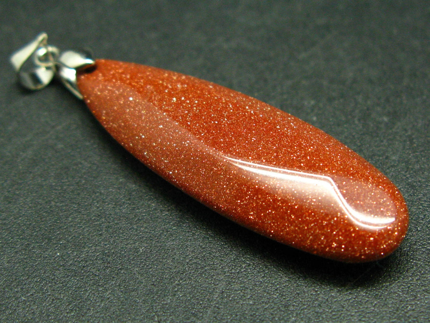 Reddish Brown Goldstone Pendant - 1.9"