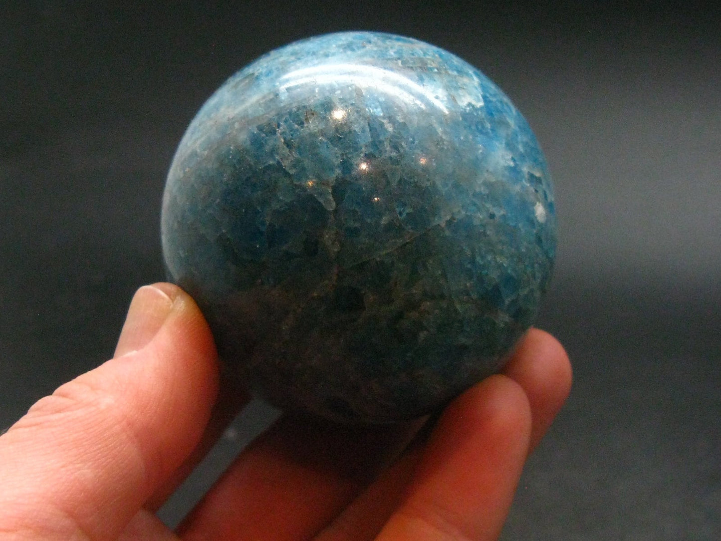Large neon blue Apatite sphere from Madagascar- 268.58 GRAMS - 2.2"