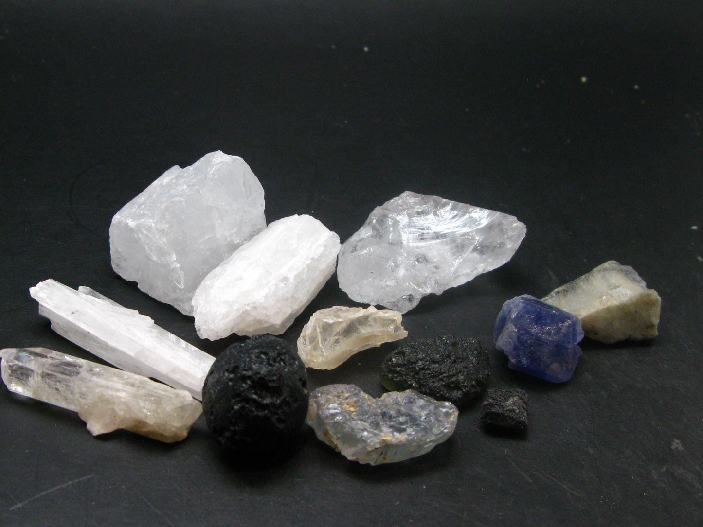 Synergy 12 Set Phenakite Moldavite Natrolite Petalite Danburite Tektite Scolecite Herderite Tanzanite Brookite 175.76 Gr