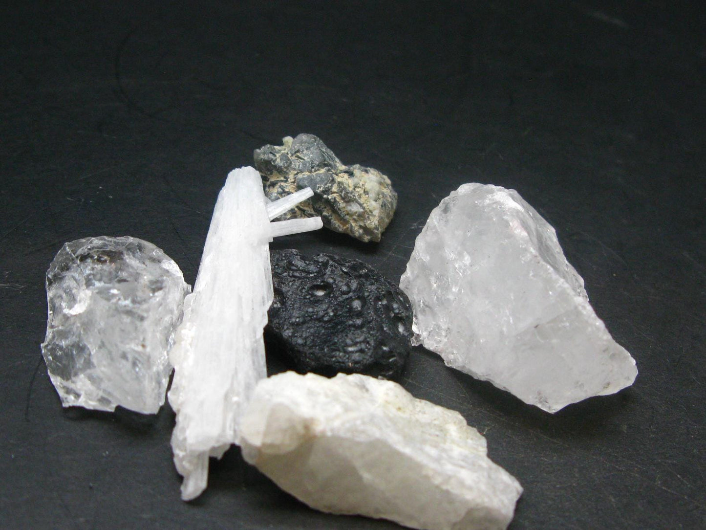 Synergy 12 Set Phenakite Moldavite Natrolite Petalite Danburite Tektite Scolecite Herderite Tanzanite Brookite 71.31 Gr