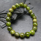 Peridot Genuine Bracelet ~ 7 Inches ~ 9mm Round Beads