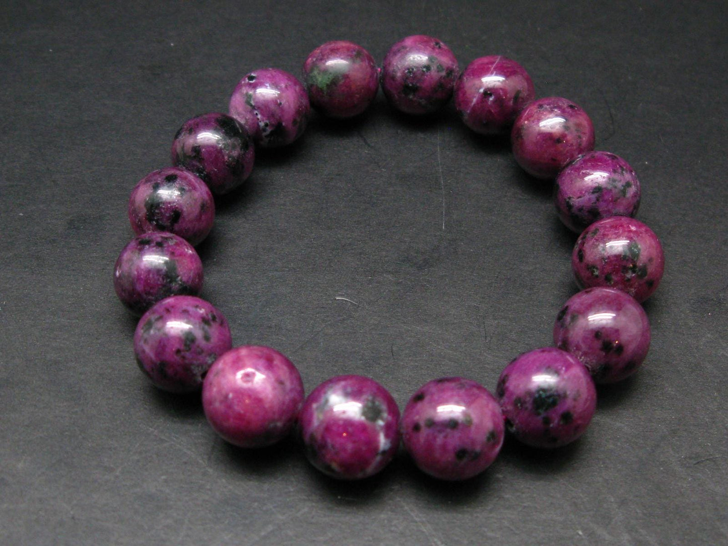 Ruby Genuine Bracelet ~ 7.5 Inches ~ 14mm Round Beads