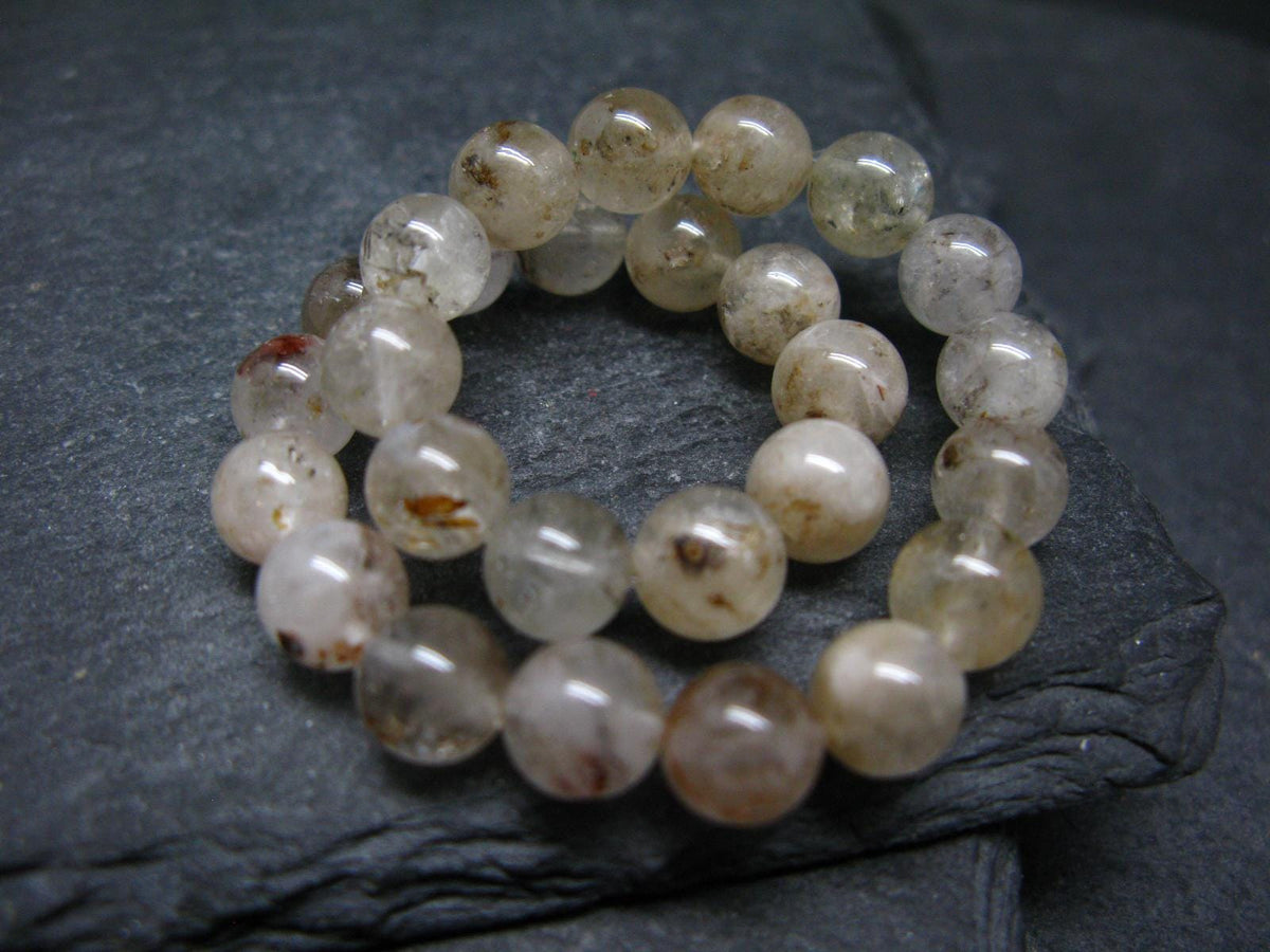 Rare Petroleum Oil In Quartz Crystal Bracelet - 7 Inches - 7mm Round Beads
