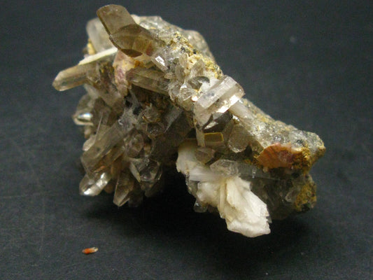 Bertrandite with Rhodochrosite on Quartz cluster from Russia - 2.3"