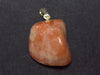 Tumbled Brightly Polished Sunstone Silver Pendant From Tanzania - 1.1"