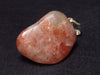 Tumbled Brightly Polished Sunstone Silver Pendant From Tanzania - 1.1"
