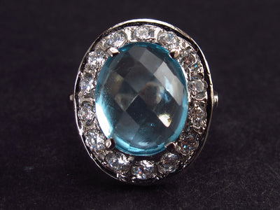 Natural Oval Shaped Faceted Sky Blue Topaz Crystal Sterling Silver Ring with CZ - Size 6.75
