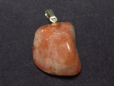 Tumbled Brightly Polished Sunstone Silver Pendant From Tanzania - 1.1"